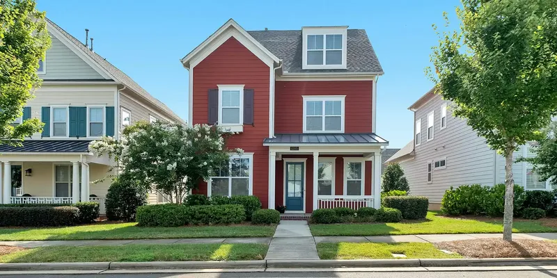 Sunny modern home exterior illustrating a long-term fixed-rate housing plan