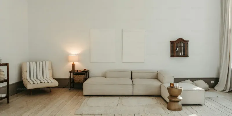 Bright living room with natural light, neutral furnishings, and an open home interior