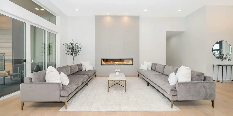 Natural-light living room where a borrower can consider long-term housing plans