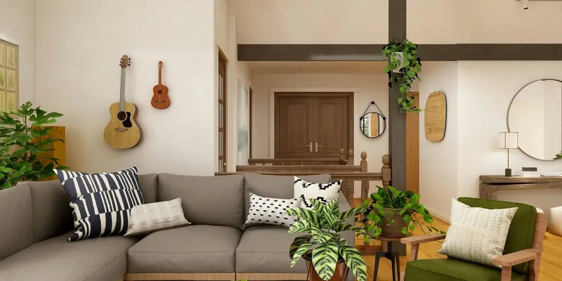 Bright living room with a sofa, armchair, and natural light